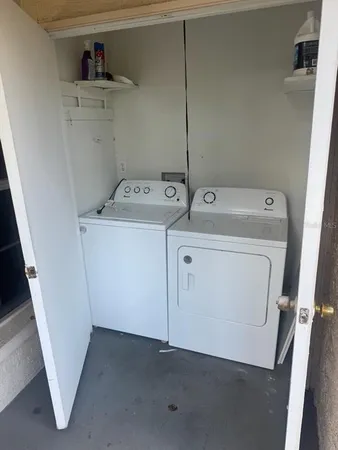 a utility room with dryer and washer