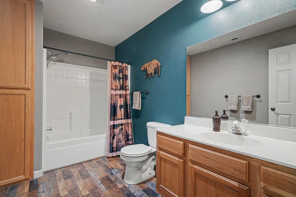 26845 Spring Court Pioneer, CA 95666 - Photo 25 of 89 a bathroom with a sink a toilet and shower