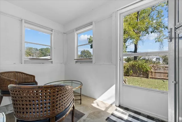 a bedroom with furniture and a couch