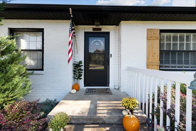 a front view of a house with a porch
