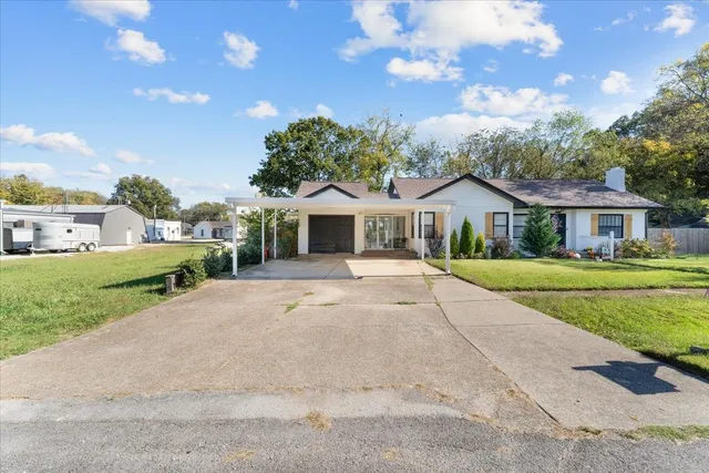 a front view of house with yard