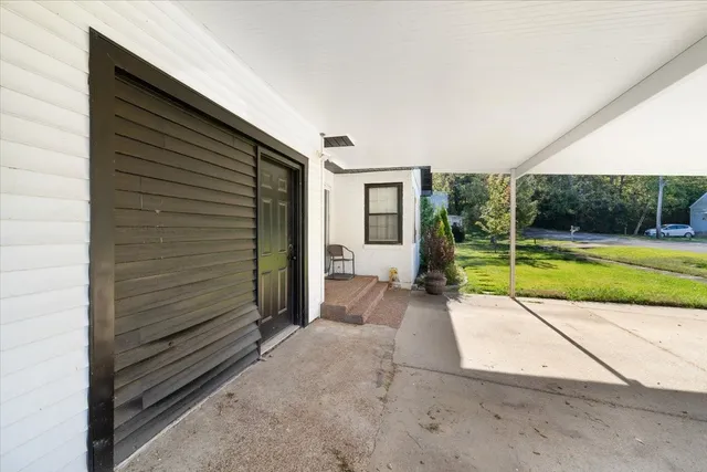 a backyard of a house with lots of green space