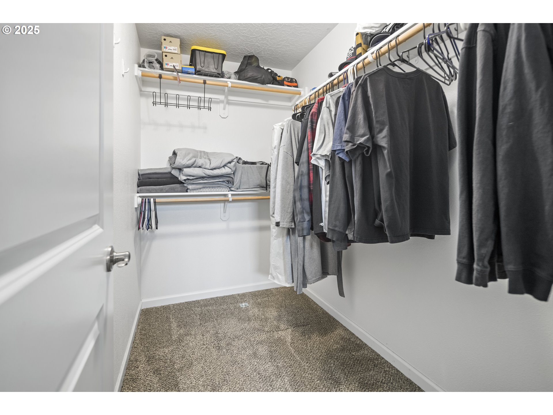 1871 Southeast Academy Street Dallas, OR 97338 - Photo 13 of 24 a view of walk in closet with clothes and shoes