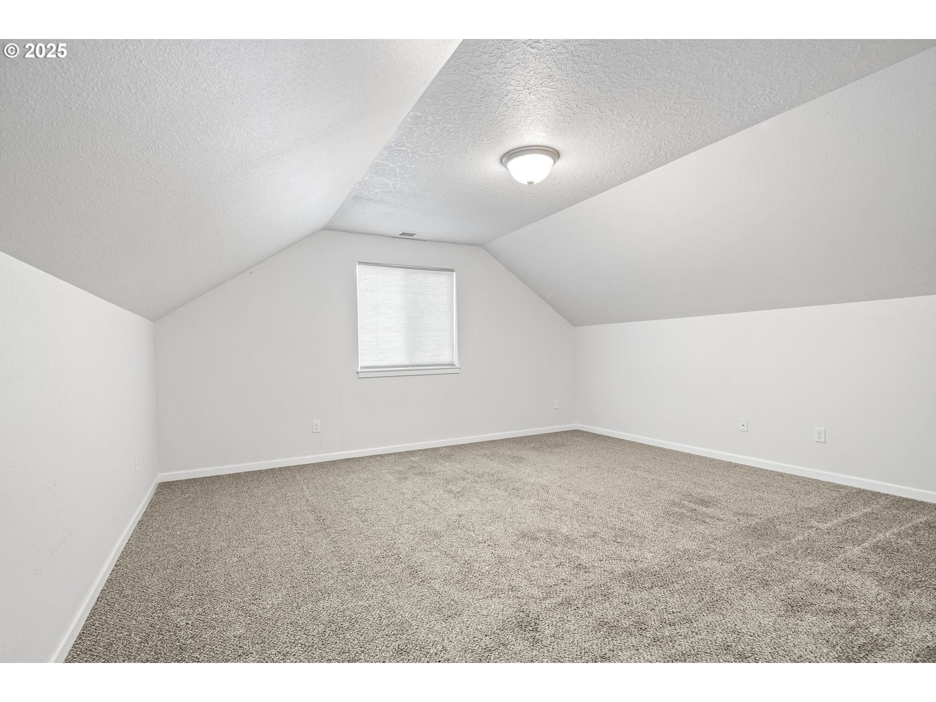 1871 Southeast Academy Street Dallas, OR 97338 - Photo 16 of 24 a view of an empty room with a window