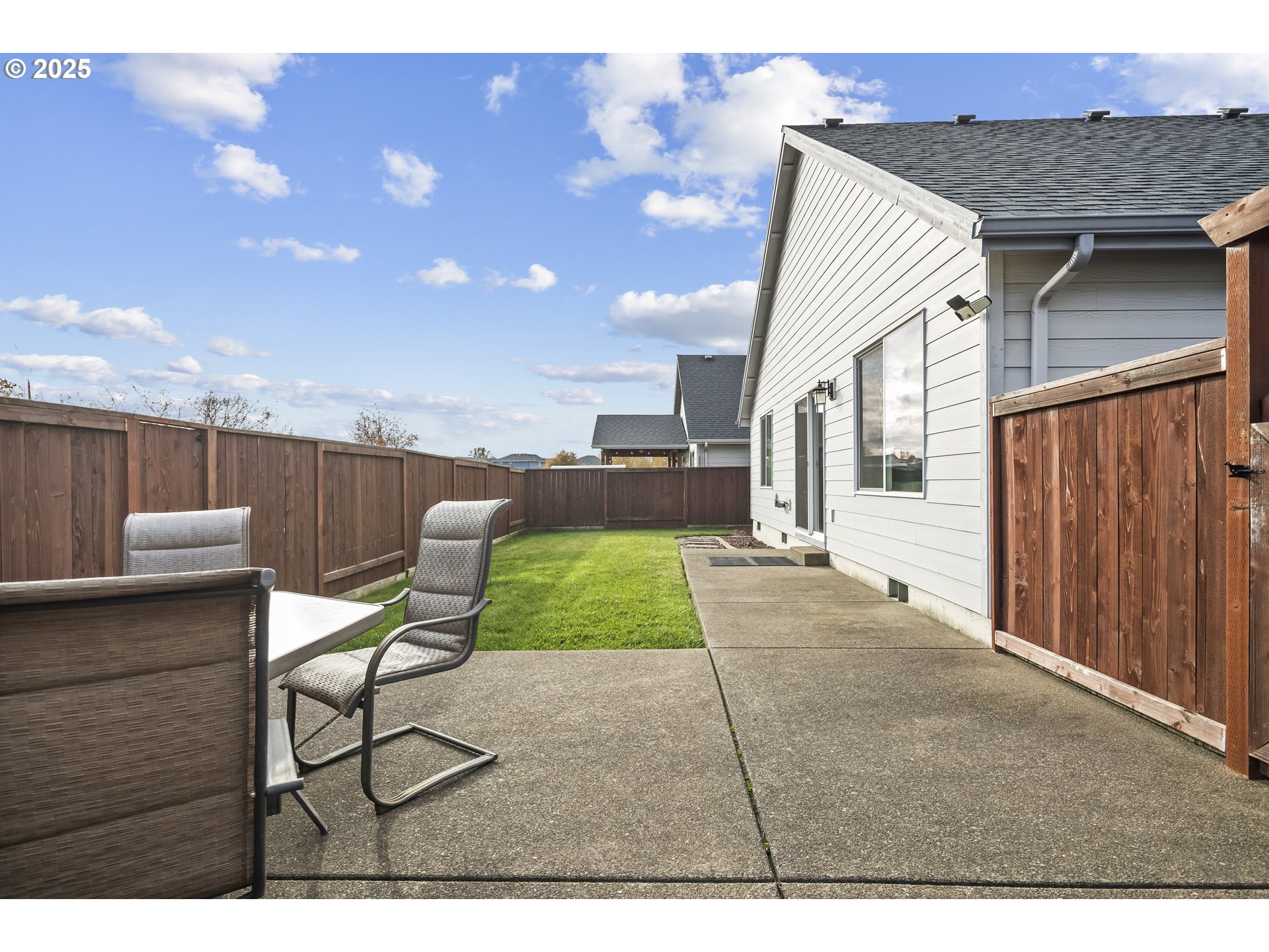 1871 Southeast Academy Street Dallas, OR 97338 - Photo 20 of 24 a view of a backyard with sitting area