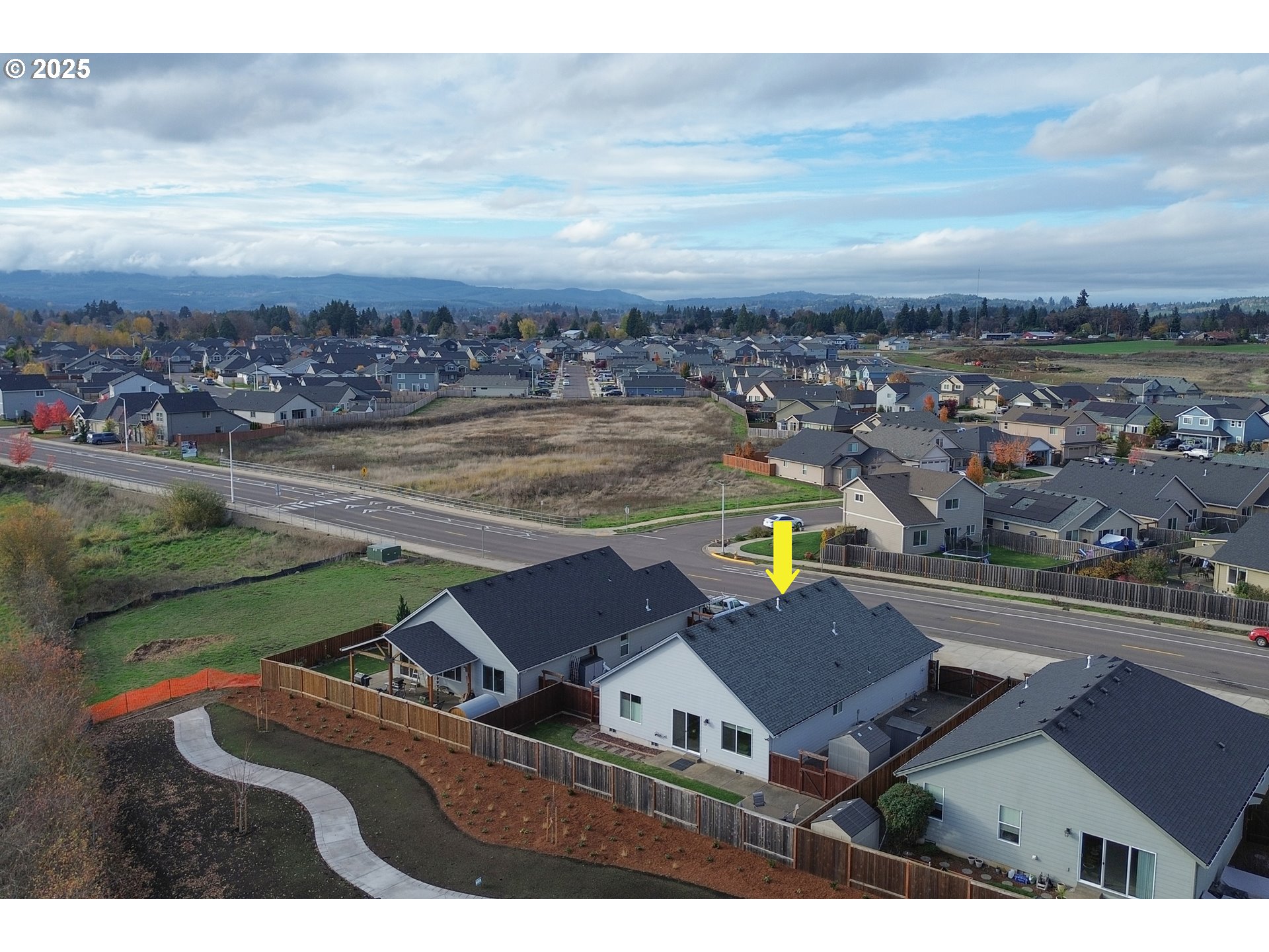 1871 Southeast Academy Street Dallas, OR 97338 - Photo 22 of 24 an aerial view of residential houses with outdoor space
