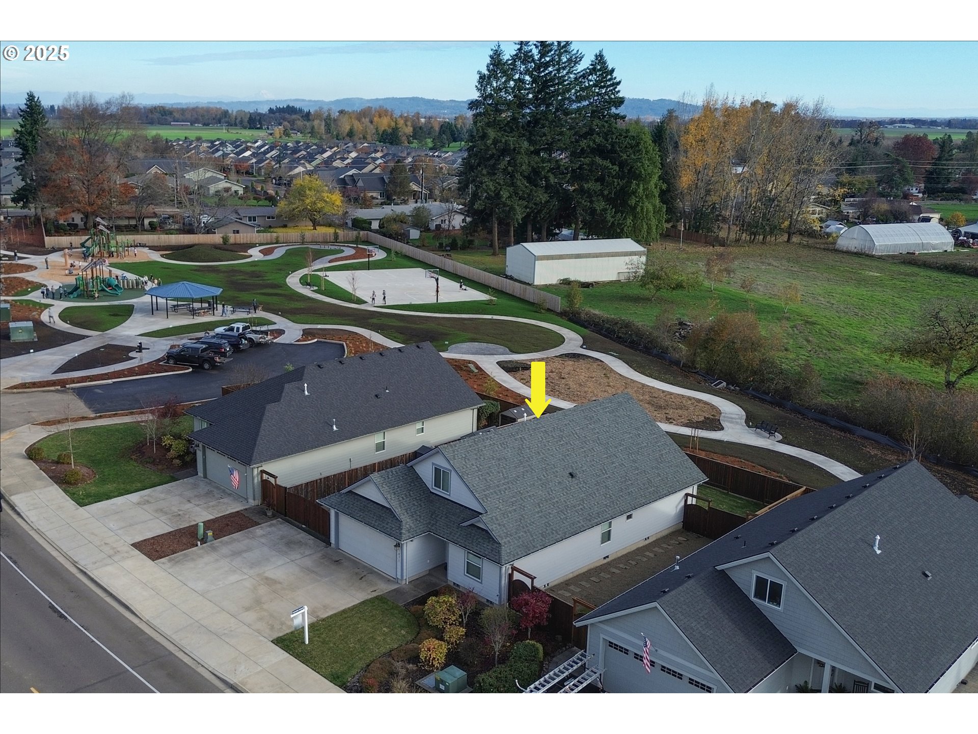 1871 Southeast Academy Street Dallas, OR 97338 - Photo 23 of 24 an aerial view of a house with garden space and outdoor seating