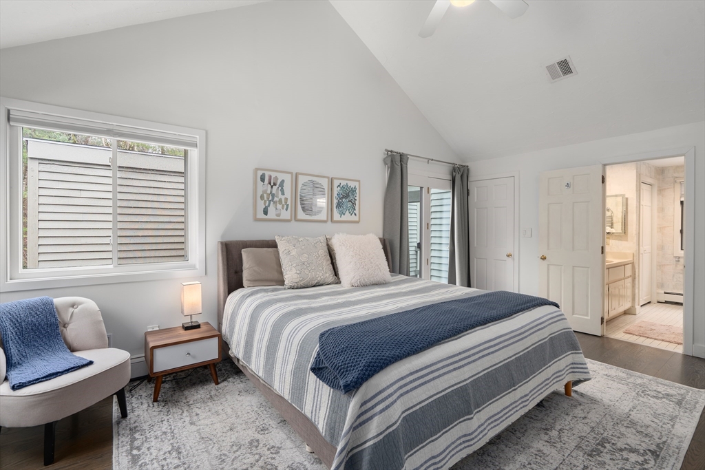 15 Adams Road Sudbury, MA 01776 - Photo 24 of 41 a spacious bedroom with a bed and a couch