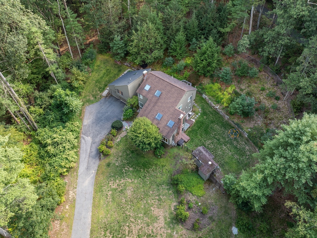 15 Adams Road Sudbury, MA 01776 - Photo 36 of 41 an aerial view of a house with a yard