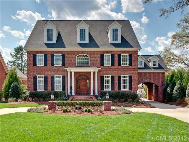 2228 Overhill Road Charlotte, NC 28211 - Photo 1 of 16 front view of a brick house with a yard