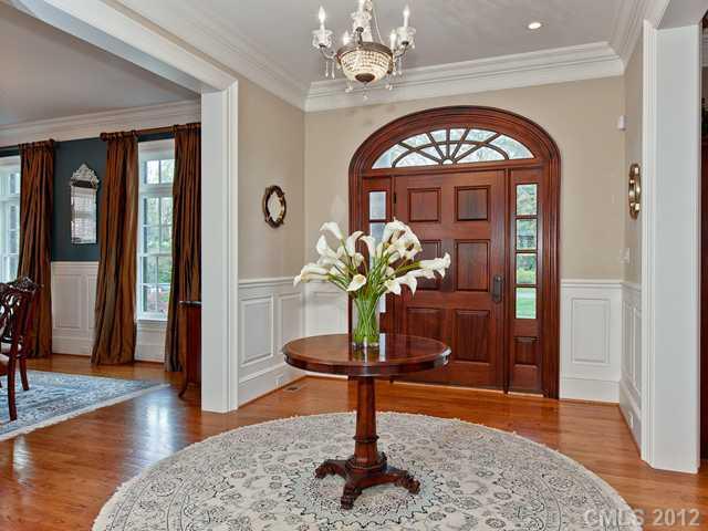 2228 Overhill Road Charlotte, NC 28211 - Photo 2 of 16 a living room with chandelier furniture and a chandelier