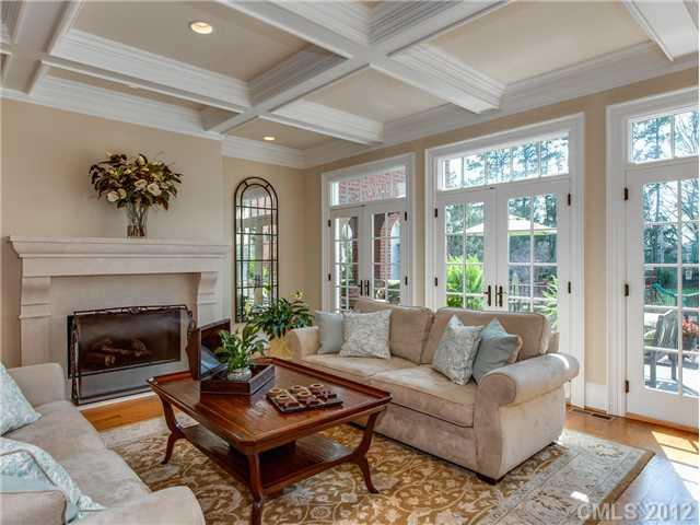 2228 Overhill Road Charlotte, NC 28211 - Photo 3 of 16 a living room with furniture a fireplace and a large window
