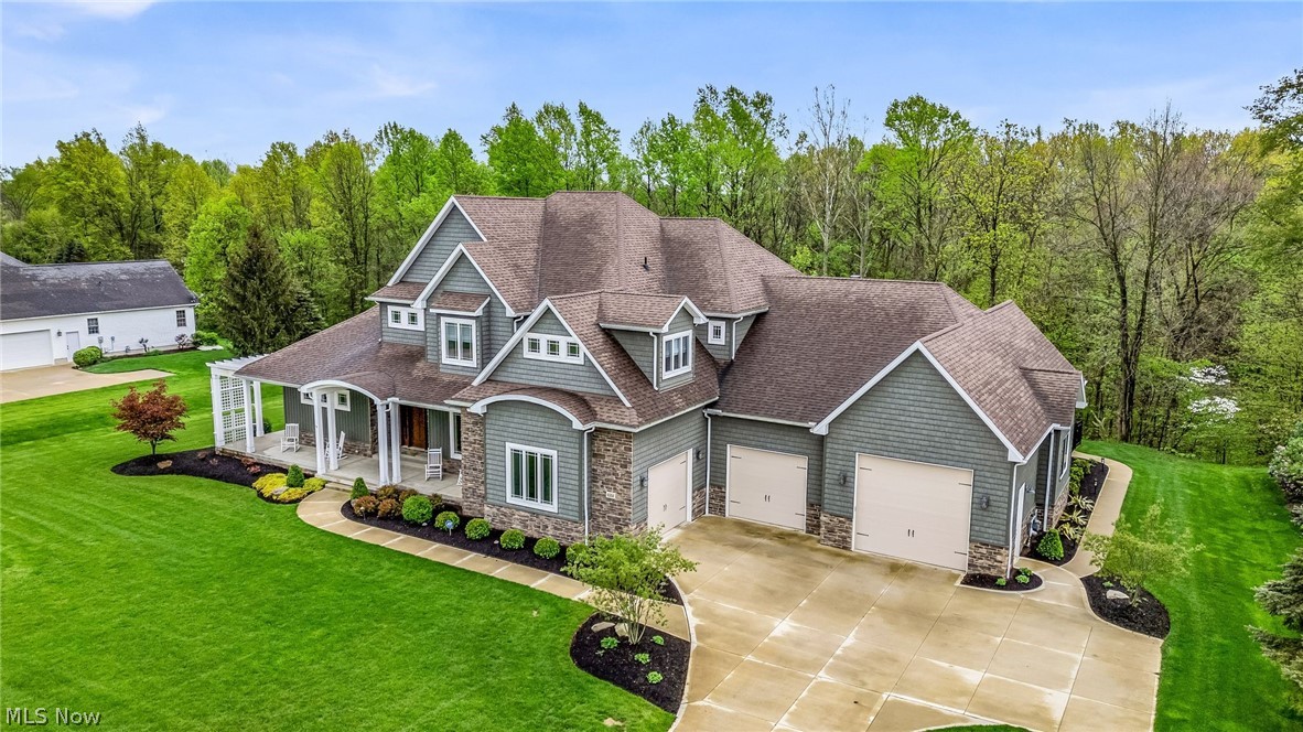 41264 Ravines Edge Way Lagrange, OH 44050 - Photo 1 of 43 Front of house with 3 car garage .