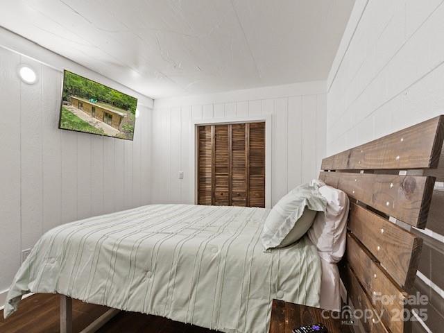 167 Simmons Ridge Road Spruce Pine, NC 28777 - Photo 14 of 44 a bedroom with a bed and a window