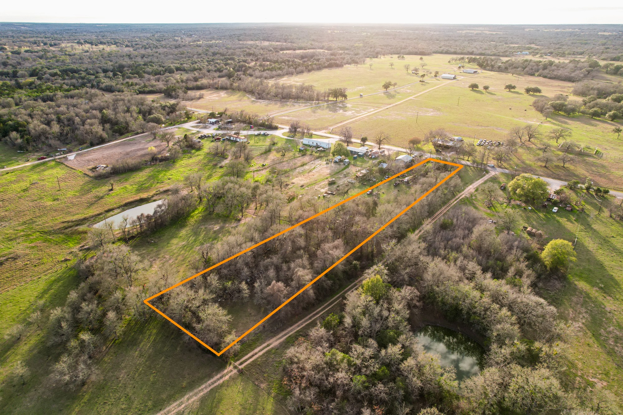 269 Old Lake Road Smithville, TX 78957 - Photo 10 of 16 an aerial view of residential houses with outdoor space