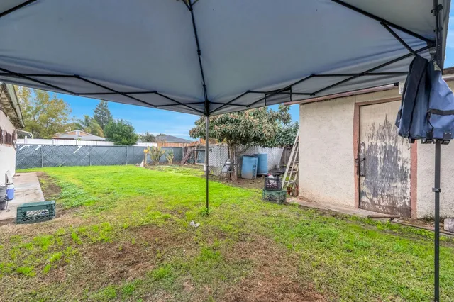 a view of a backyard with garden