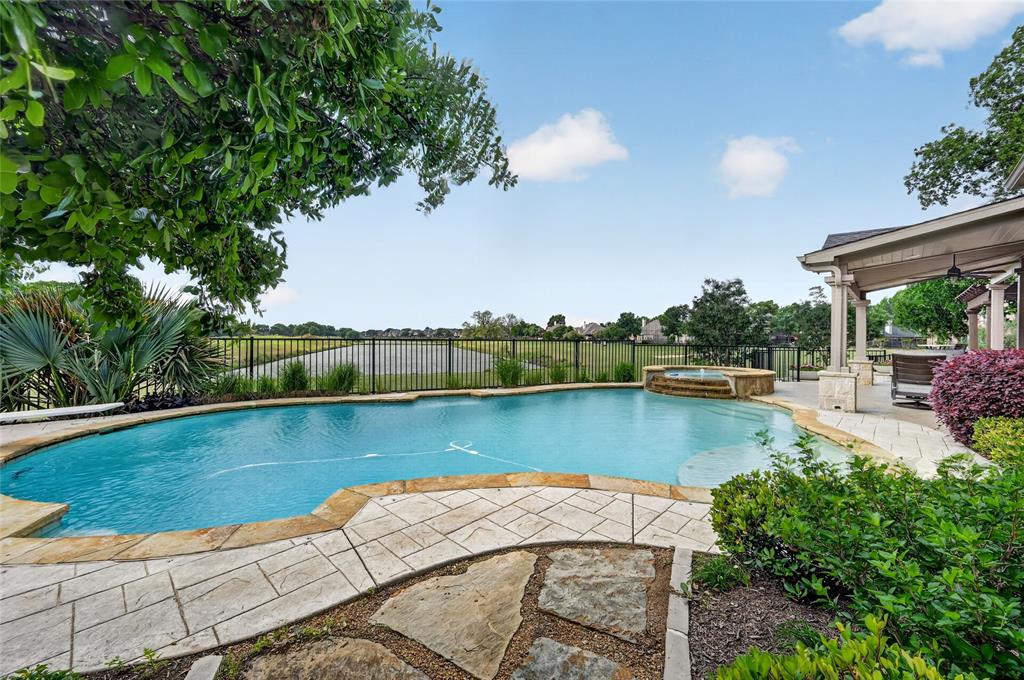 139 Trinity Court Coppell, TX 75019 - Photo 2 of 40 This entertainer’s paradise boasts serene pond vistas and a heavily treed backdrop bordering the Trinity River.