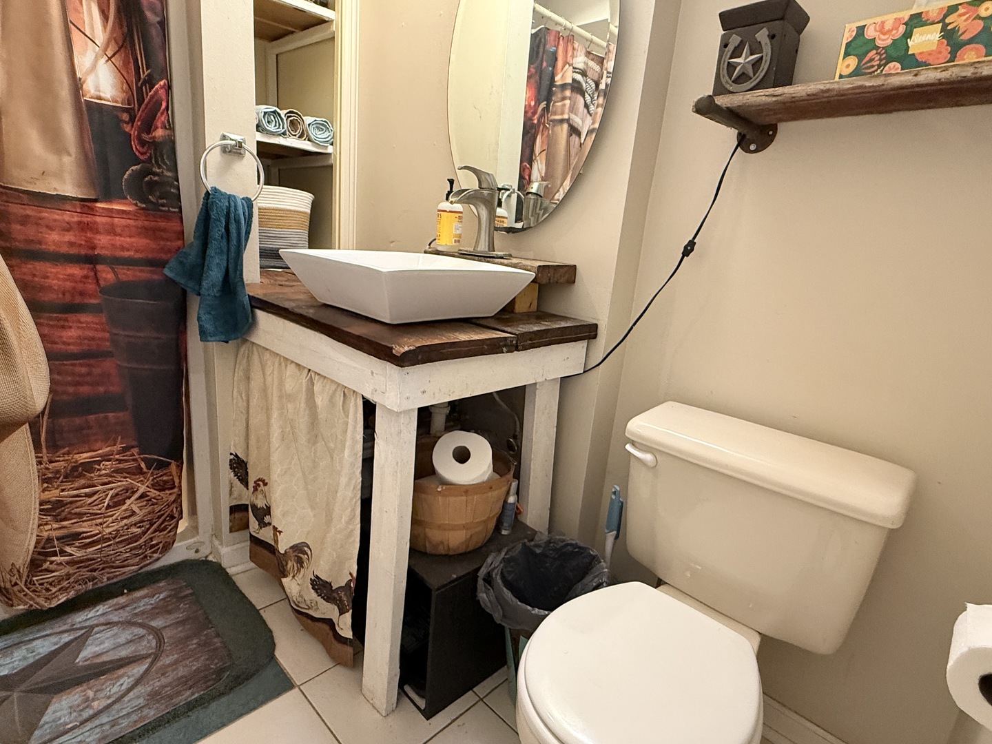 22503 2800th Road North Odell, IL 60460 - Photo 11 of 30 a bathroom with a toilet and a shower curtain