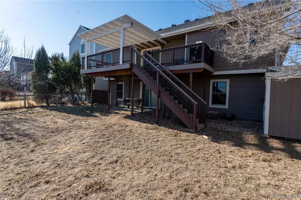 a house with trees in front of it