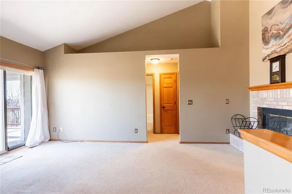 a view of a livingroom with a fireplace