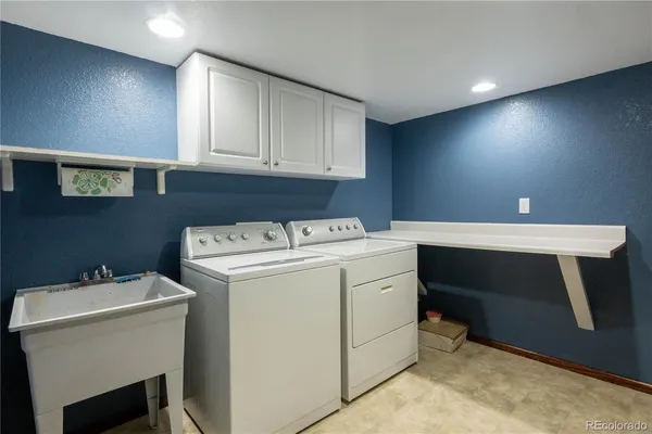a bathroom with a toilet sink and a window