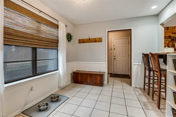 a view of walk in closet with window