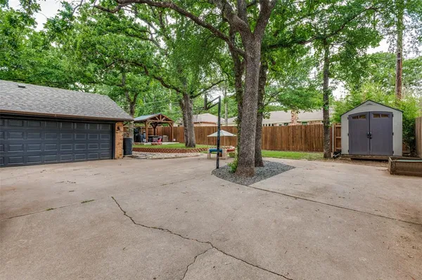 a house with trees in front of it