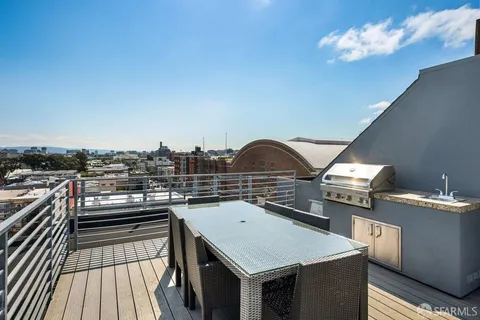 a terrace with a city view