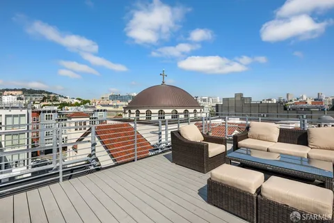 a view of a terrace with city view