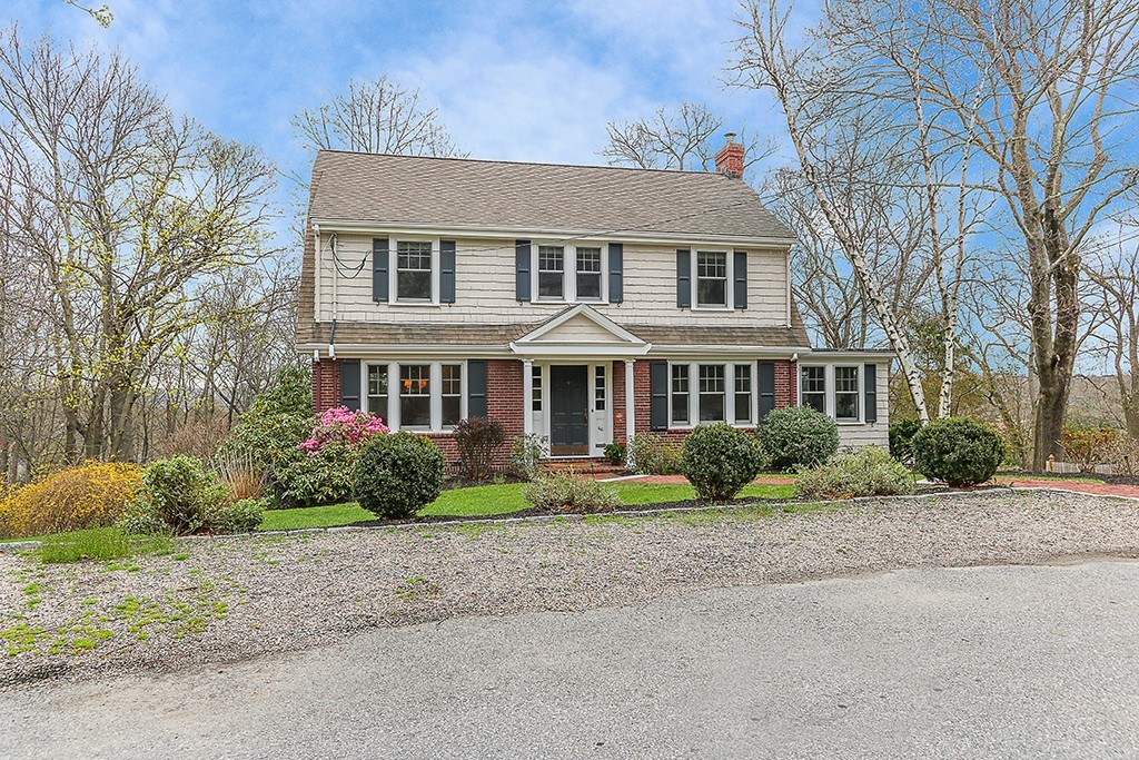 46 Greylock Road Newton, MA 02465 - Photo 1 of 25 a front view of a house with a garden