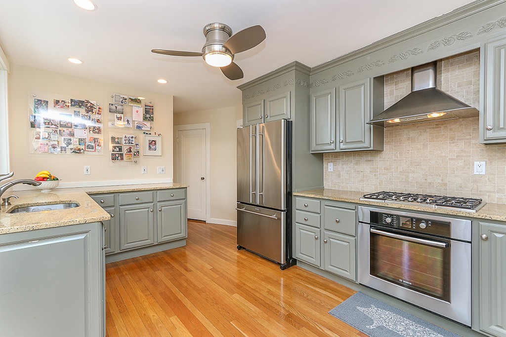 46 Greylock Road Newton, MA 02465 - Photo 12 of 25 a kitchen with a stove a sink and a refrigerator