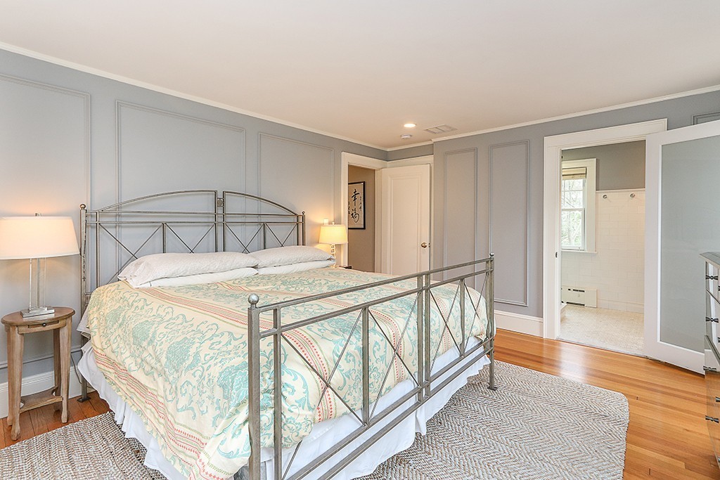 46 Greylock Road Newton, MA 02465 - Photo 15 of 25 a bedroom with a bed and wooden floor