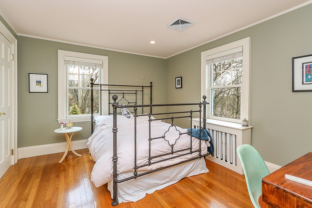 46 Greylock Road Newton, MA 02465 - Photo 16 of 25 a bedroom with a bed and wooden floor