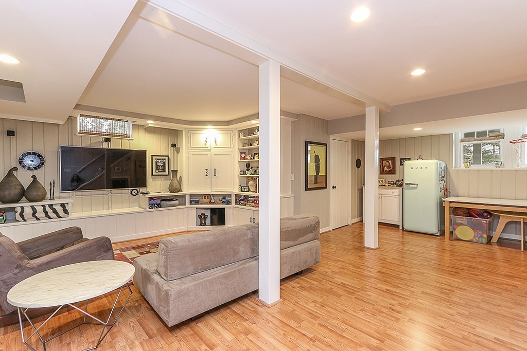 46 Greylock Road Newton, MA 02465 - Photo 20 of 25 a living room with furniture and a wooden floor