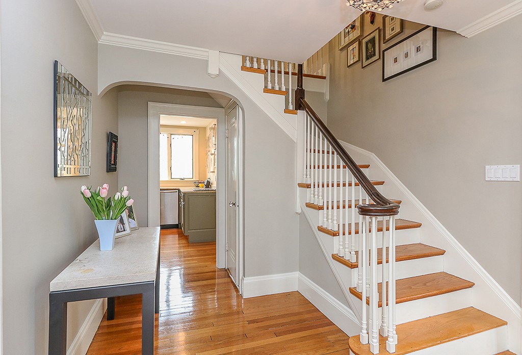 46 Greylock Road Newton, MA 02465 - Photo 4 of 25 a view of entryway and hall with wooden floor