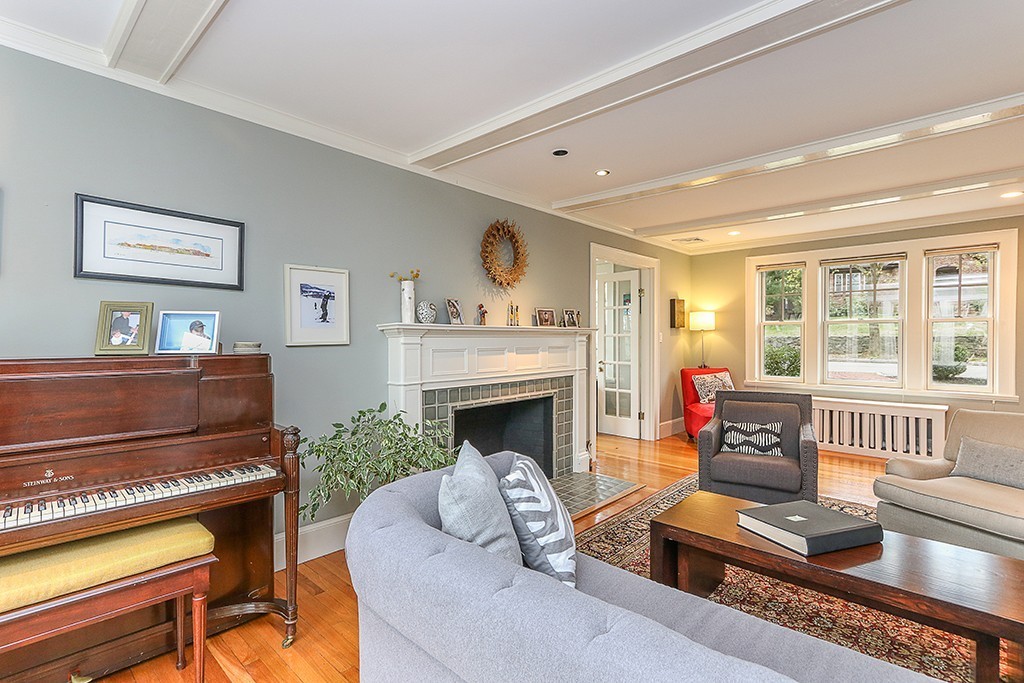46 Greylock Road Newton, MA 02465 - Photo 7 of 25 a living room with furniture and a fireplace
