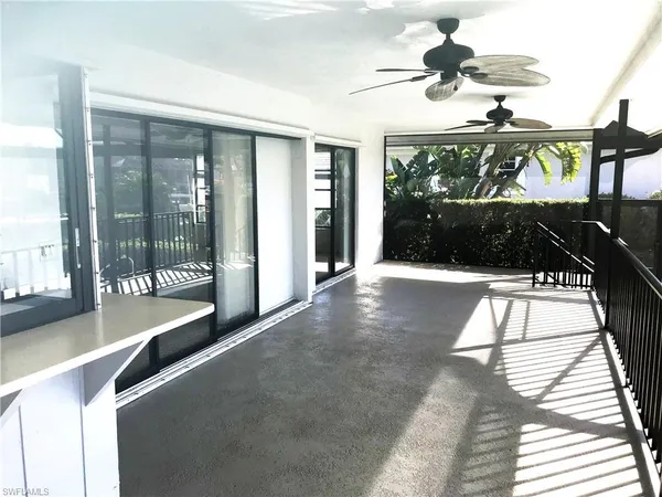 a view of swimming pool with a balcony