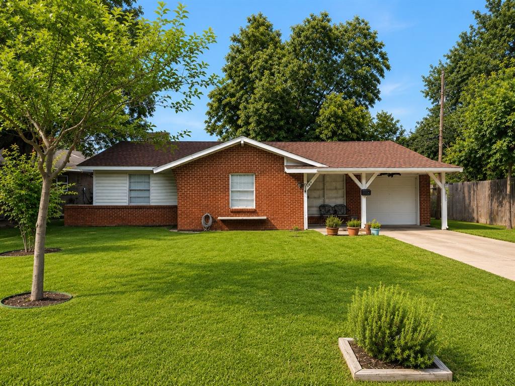 4357 Chestnut Drive Mesquite, TX 75150 - Photo 1 of 9 Brick and siding exterior residence featuring a front lawn with established trees and shrubbery