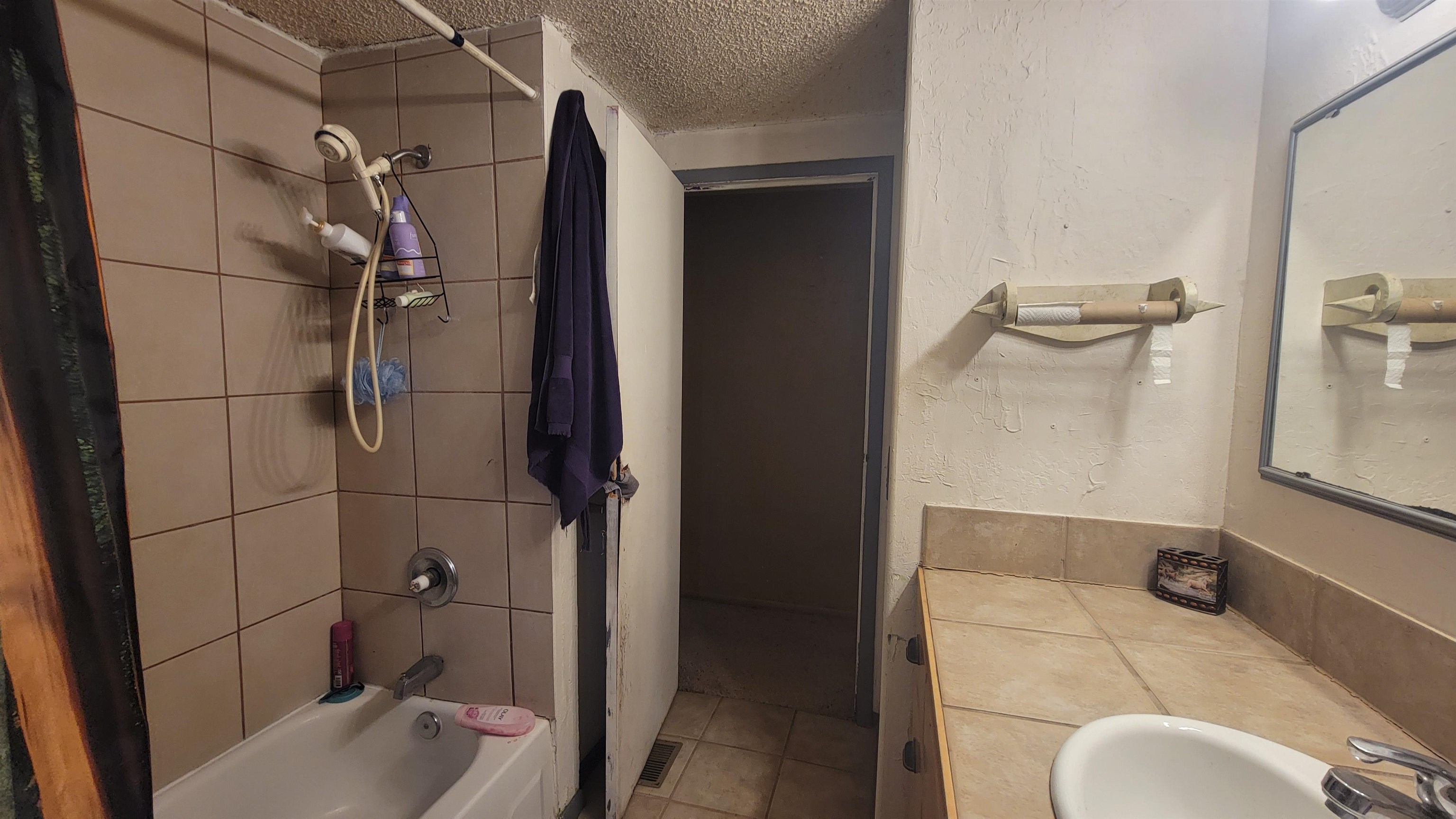 1844 M Road Fruita, CO 81521 - Photo 26 of 32 a bathroom with a sink toilet and shower