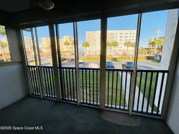 a view of a large window with an outdoor view