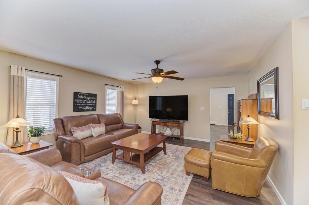 33709 West River Road Wilmington, IL 60481 - Photo 4 of 28 a living room with furniture and a flat screen tv