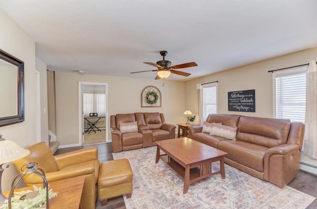 33709 West River Road Wilmington, IL 60481 - Photo 5 of 28 a living room with furniture ceiling fan and a window