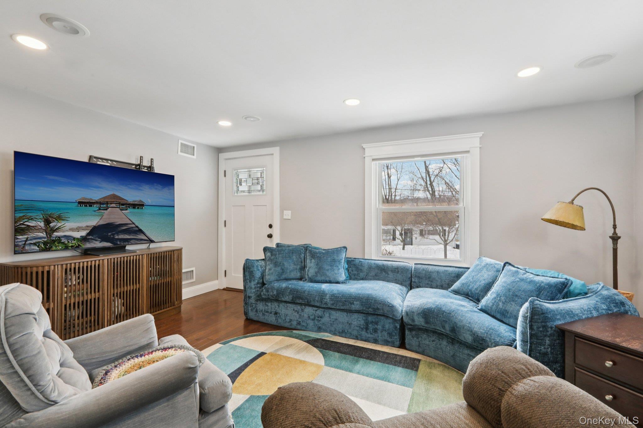 18 Lake Road Stony Point, NY 10980 - Photo 6 of 18 a living room with furniture a window and a flat screen tv
