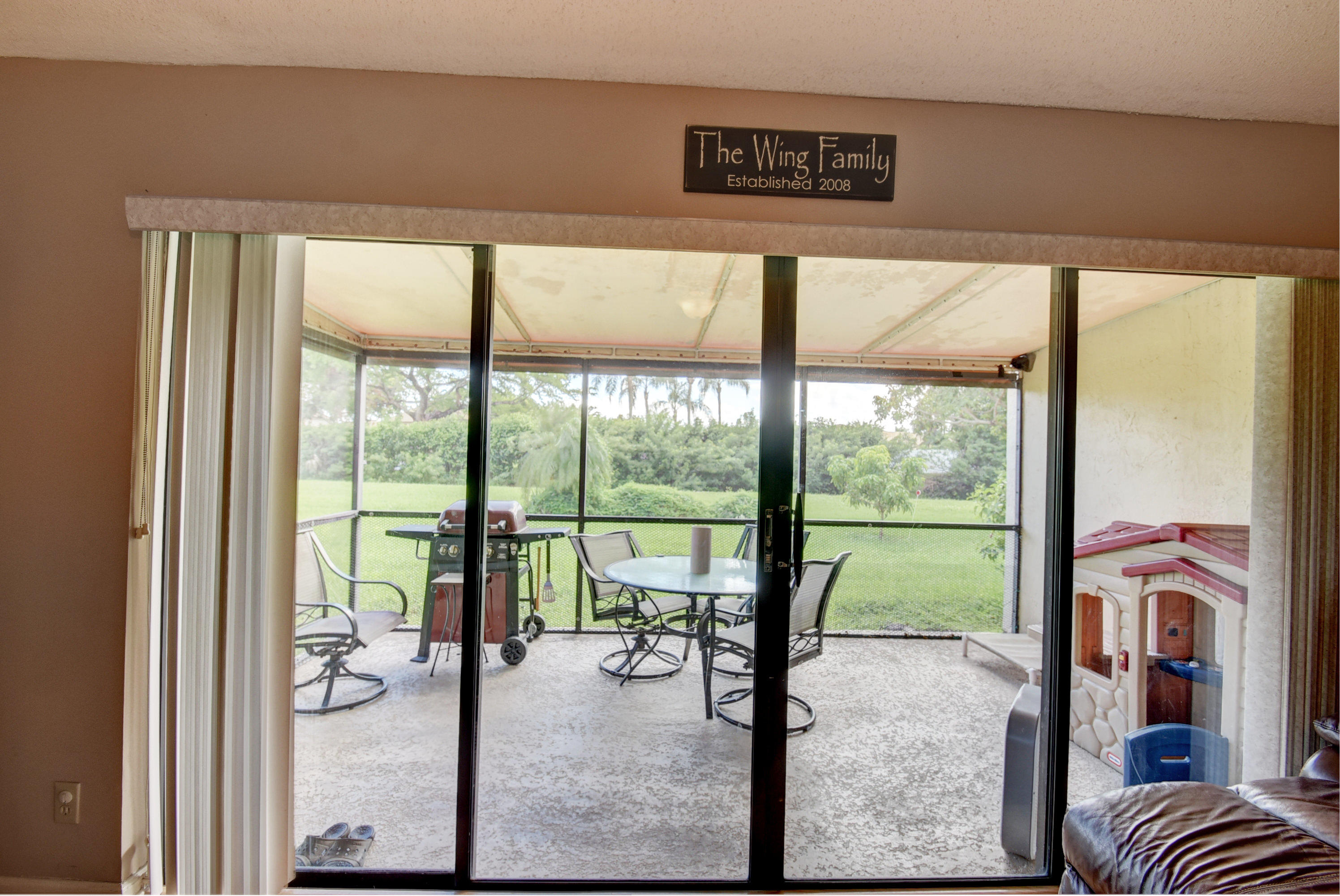 8650 Eagle Run Drive, Unit 2 Boca Raton, FL 33434 - Photo 23 of 32 Sliders to the Patio