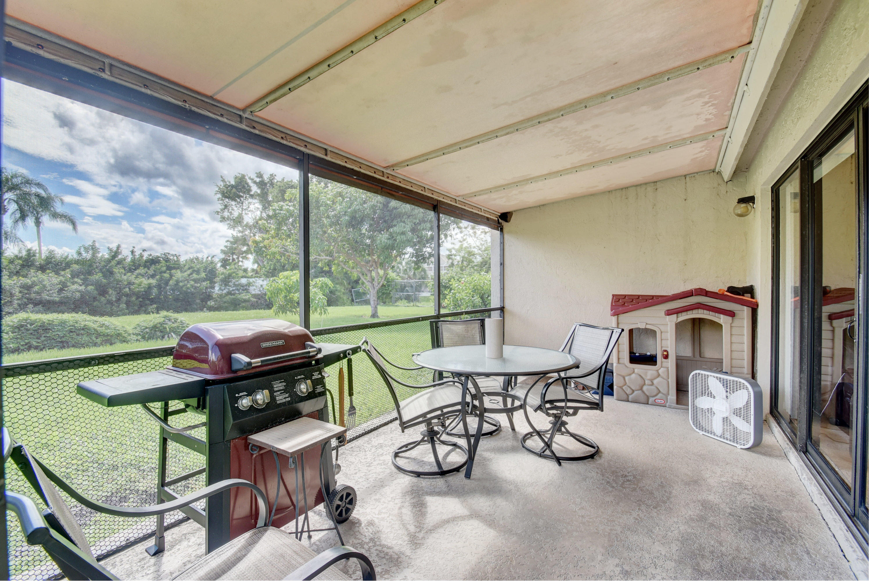 8650 Eagle Run Drive, Unit 2 Boca Raton, FL 33434 - Photo 24 of 32 Large Screened In Patio