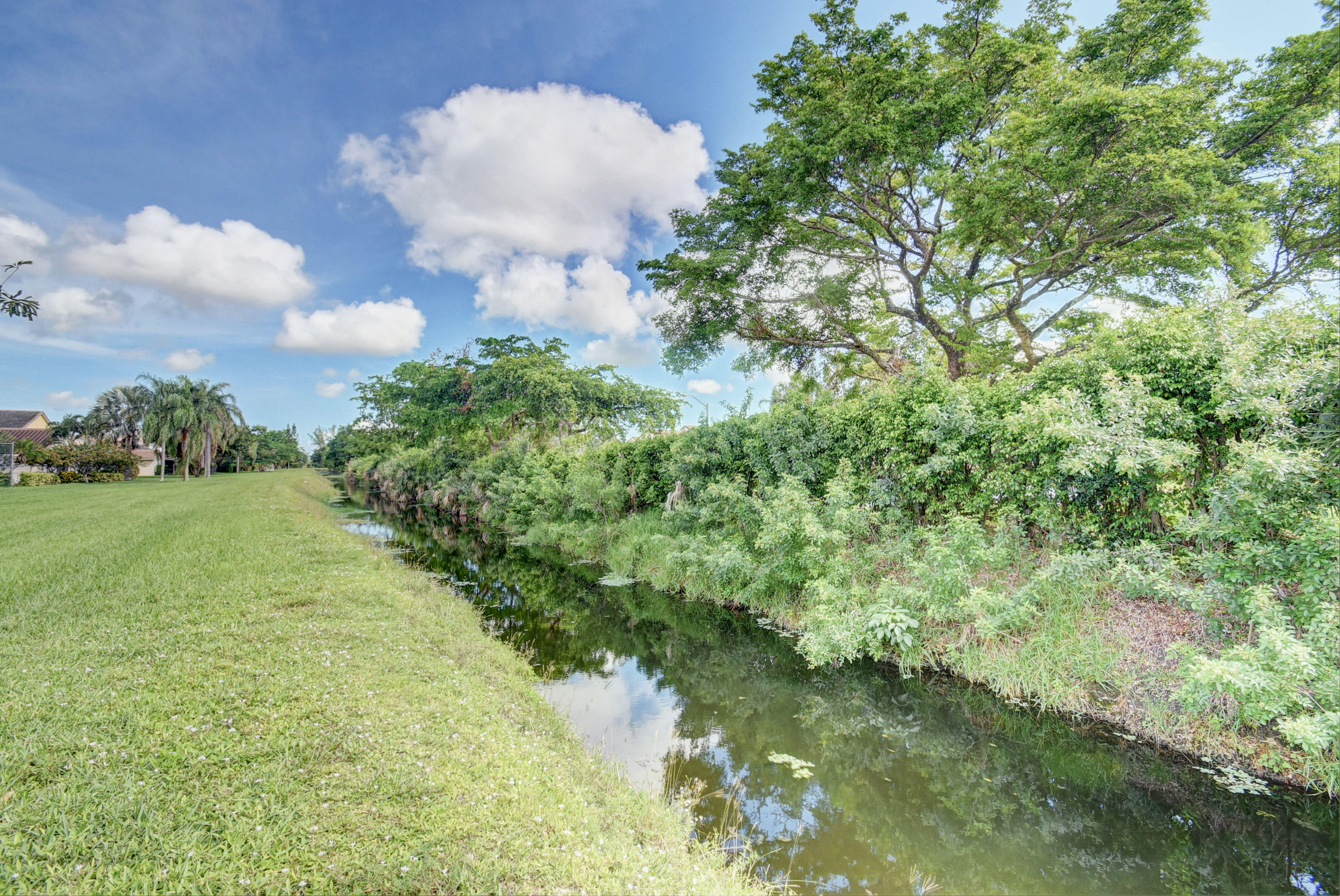 8650 Eagle Run Drive, Unit 2 Boca Raton, FL 33434 - Photo 29 of 32 Canal beyond the back yard!