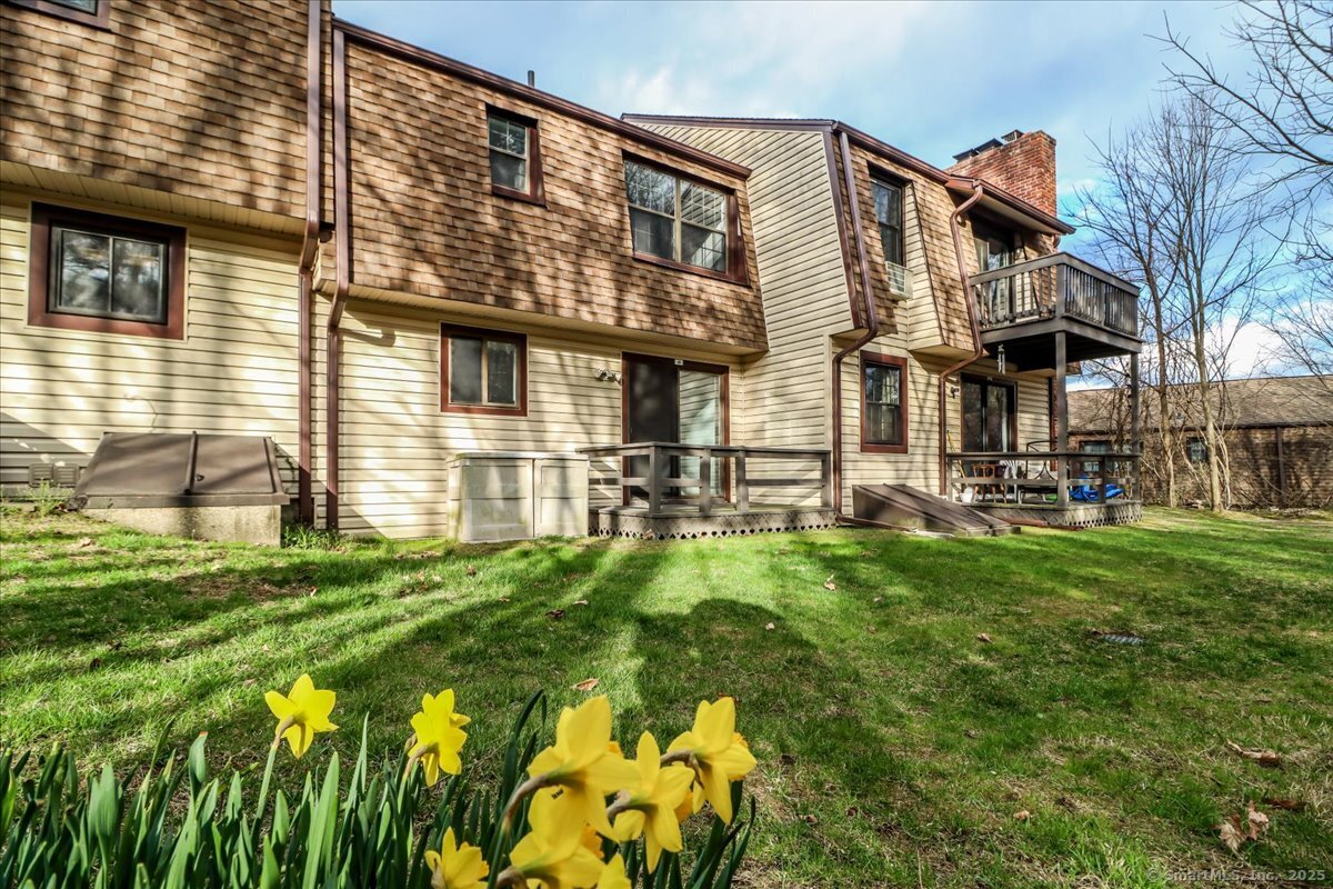 38 Homestead Lane, Unit 38 Brookfield, CT 06804 - Photo 1 of 1 a view of a building with a yard