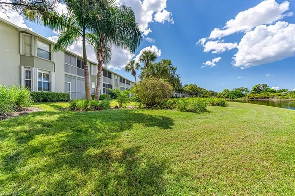 a view of a house with a big yard