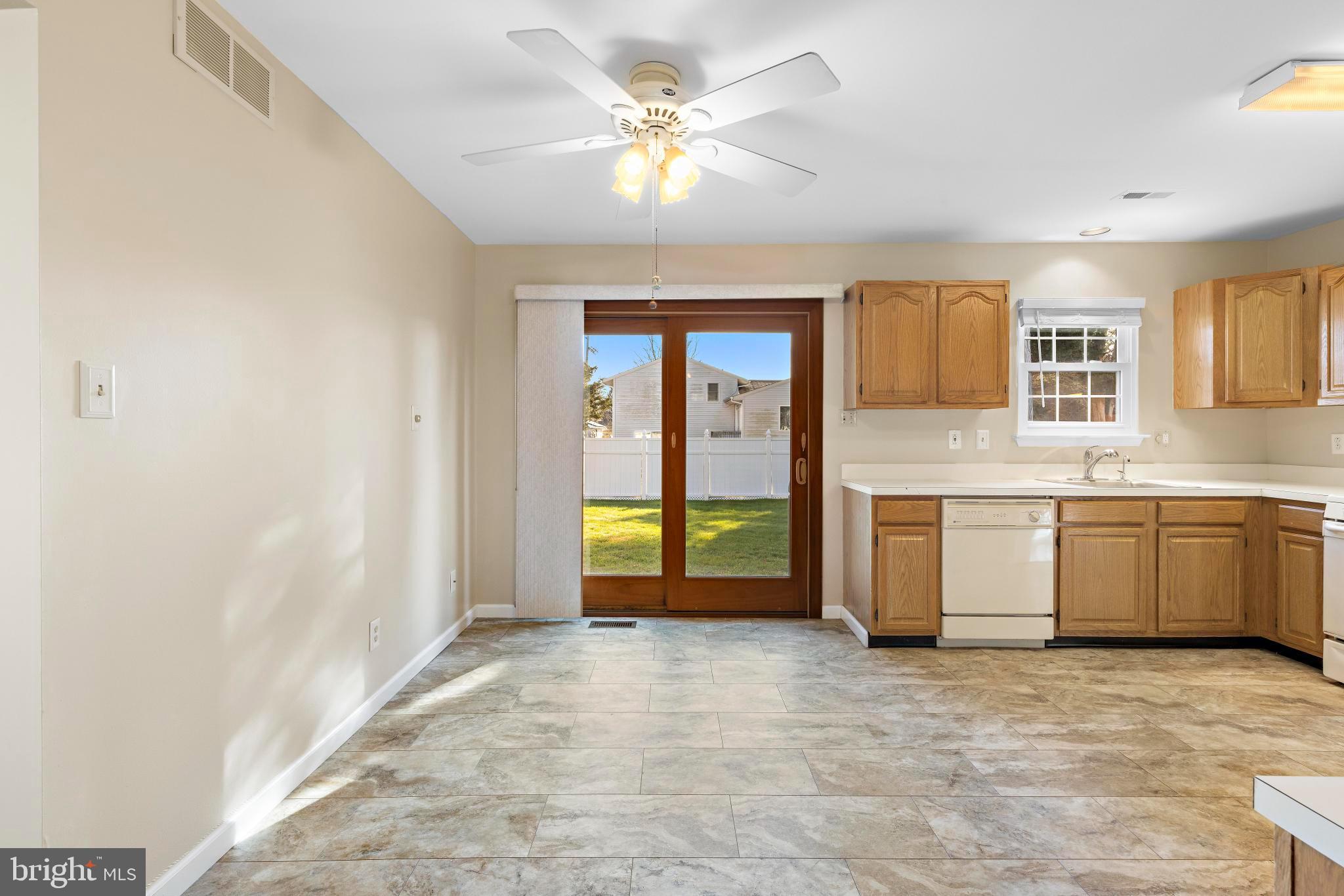 104 Greenwood Lake Road Little Egg Harbor, NJ 08087 - Photo 16 of 43 a view of a kitchen with a sink and cabinets