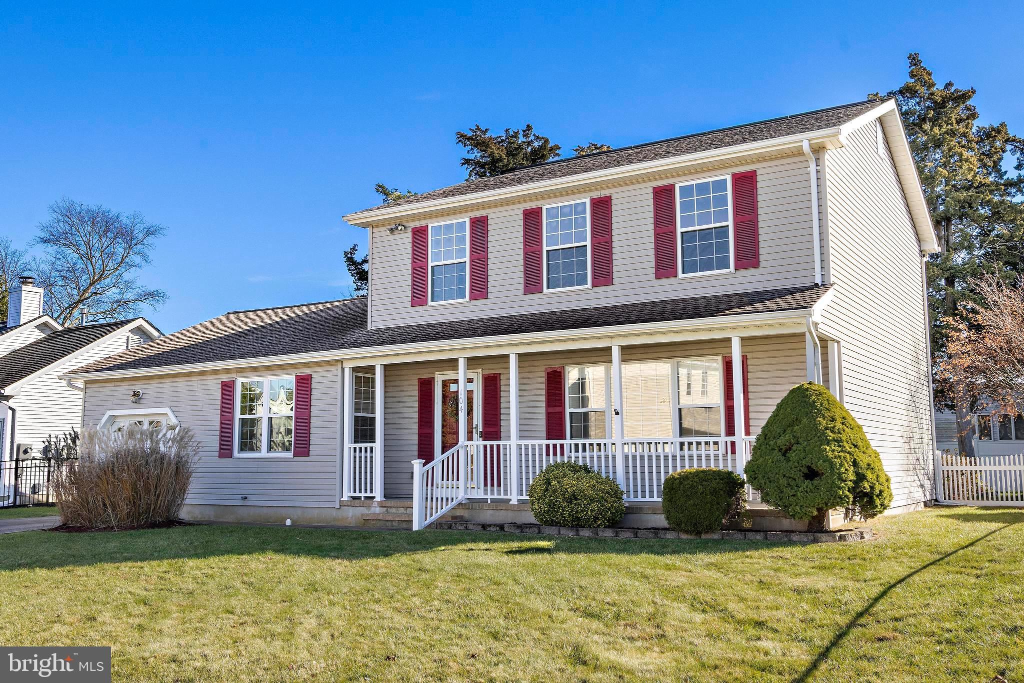 104 Greenwood Lake Road Little Egg Harbor, NJ 08087 - Photo 2 of 43 a front view of a house with garden
